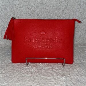 Kate Spade New York KSNY Embossed Leather Tassel Zip Clutch in Vibrant Red